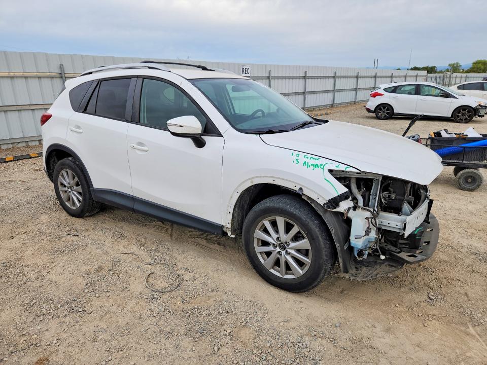 Photo 4 from auction – 2016 MAZDA CX-5 with VIN JM3KE4CY9G0901453