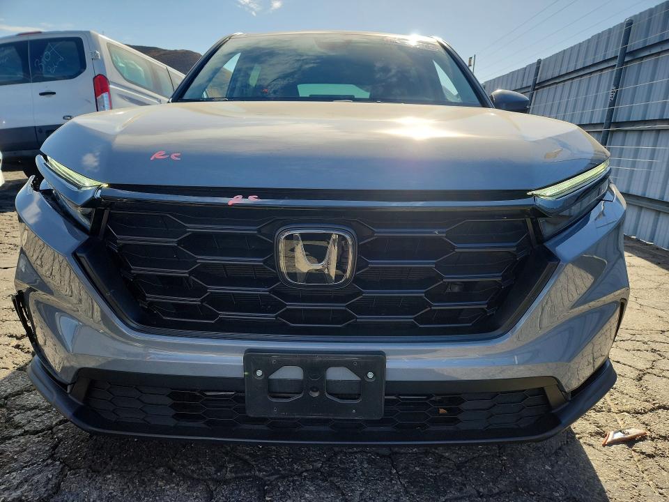Photo 5 from auction – 2023 HONDA CR-V with VIN 2HKRS3H25PH307623