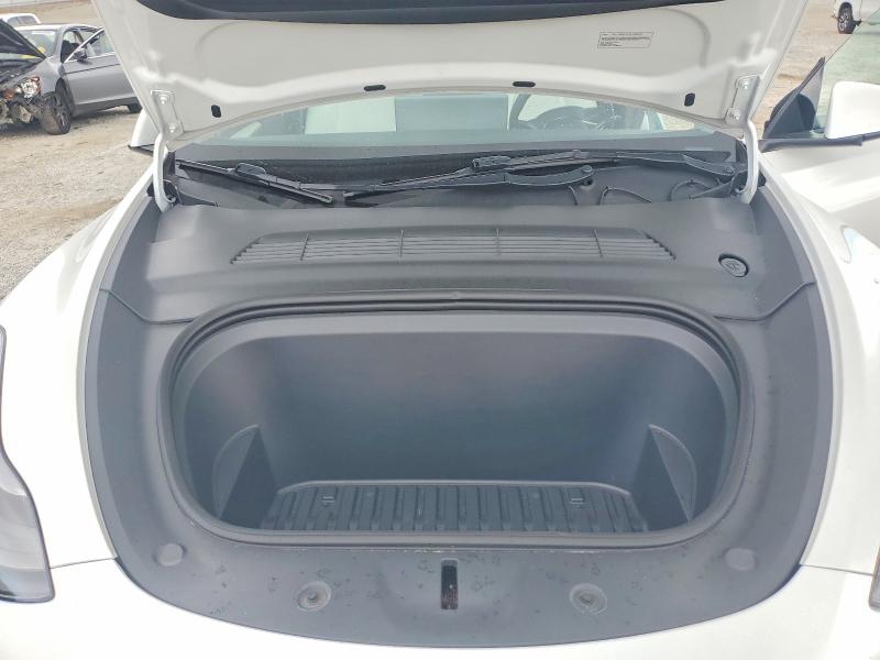 Photo 11 from auction – 2023 TESLA MODEL Y with VIN 7SAYGAEE6PF643492