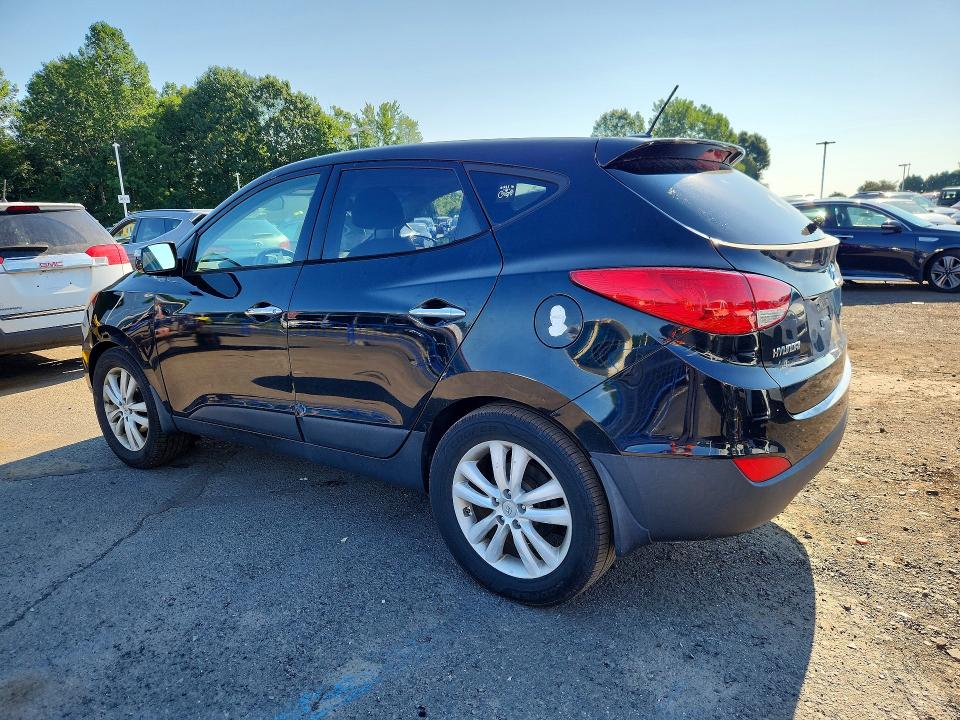Photo 2 from auction – 2012 HYUNDAI TUCSON with VIN KM8JUCAC2CU380681