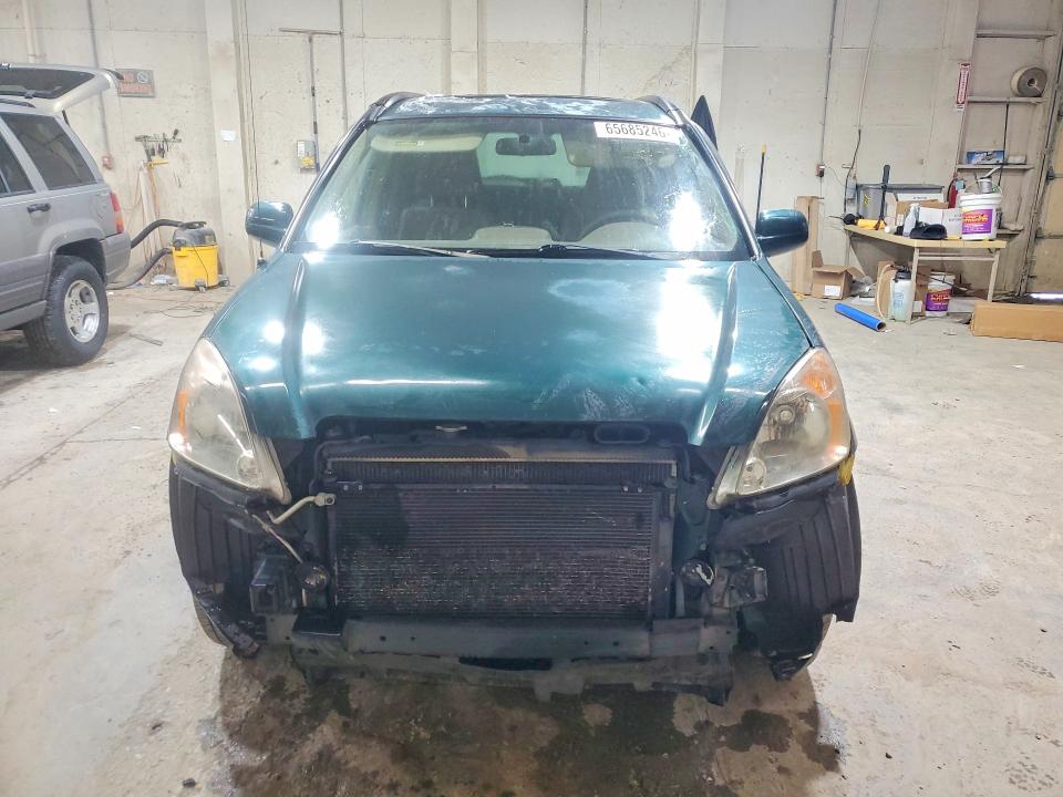 Photo 5 from auction – 2004 HONDA CR-V with VIN JHLRD78844C027367
