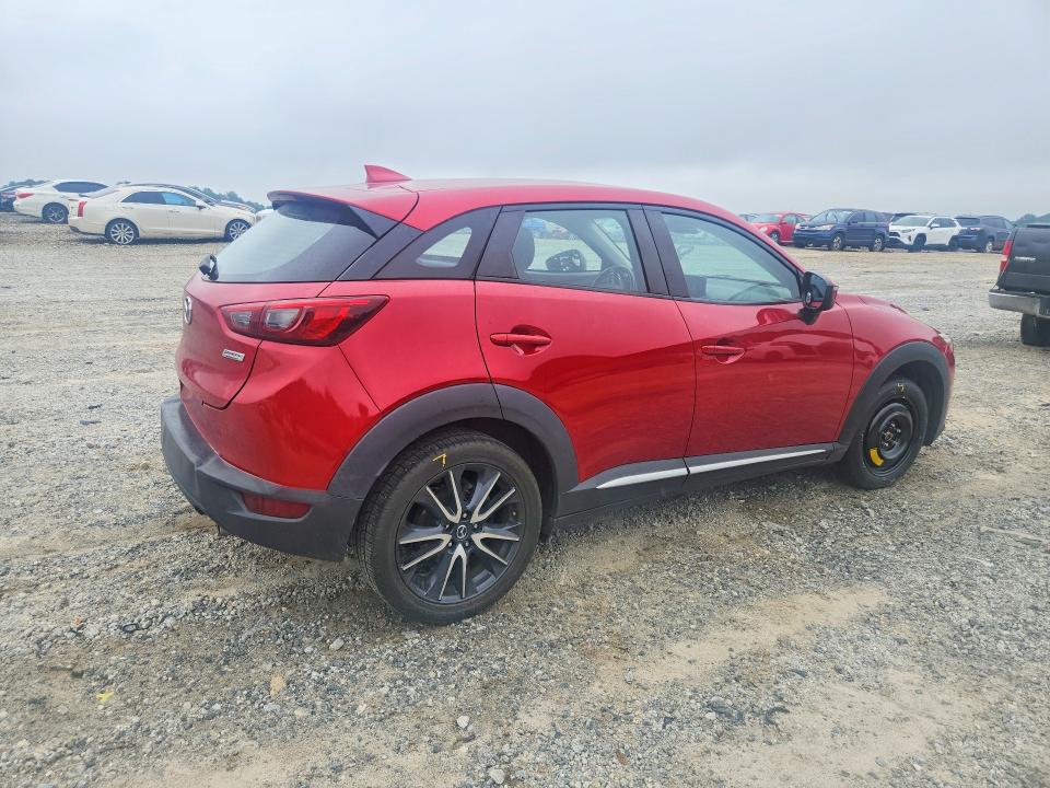 Photo 3 from auction – 2018 MAZDA CX-3 with VIN JM1DKDD74J0324905