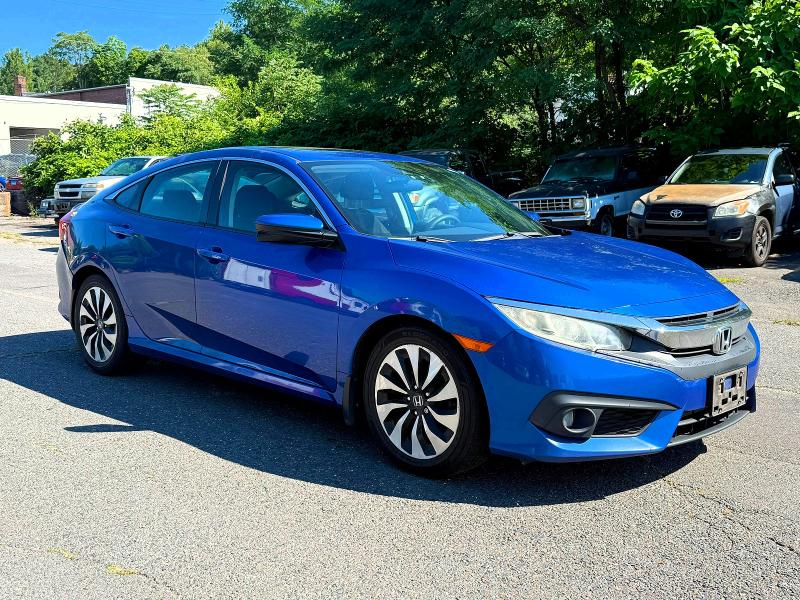 HONDA CIVIC 2016 with VIN 2HGFC1F44GH640415 - Photo from auction