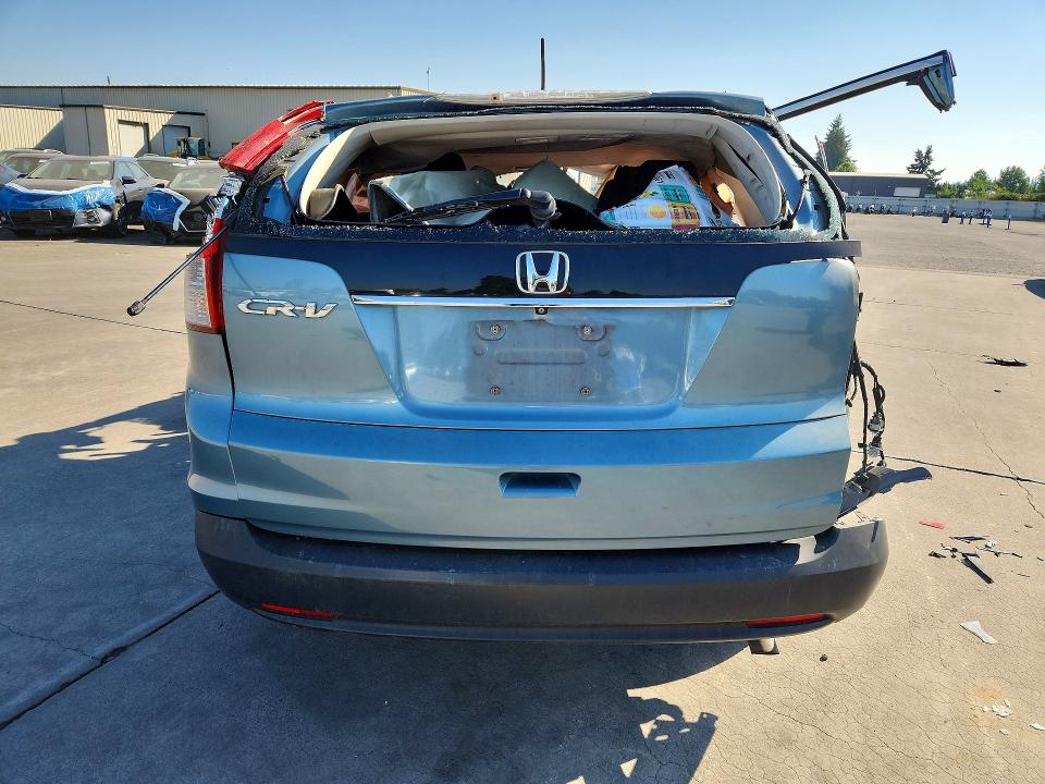Photo 6 from auction – 2014 HONDA CR-V with VIN 2HKRM3H30EH558677