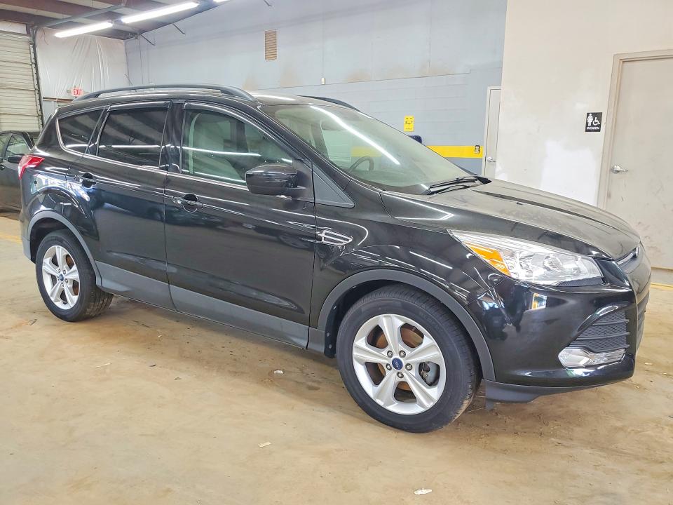 Photo 4 from auction – 2014 FORD ESCAPE with VIN 1FMCU0GX0EUB53686