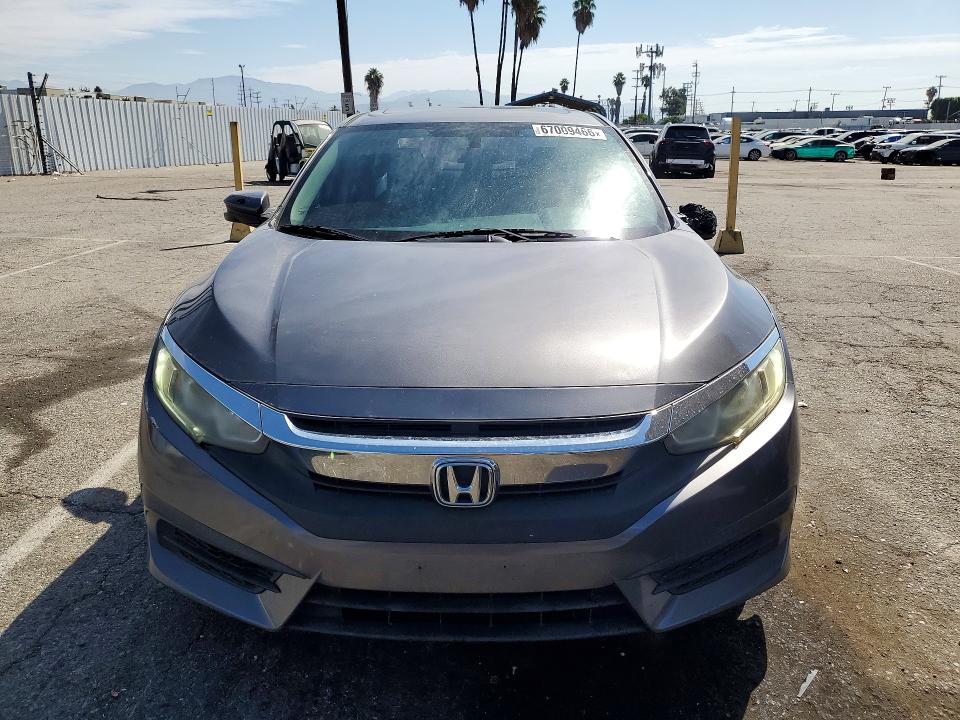 Photo 5 from auction – 2016 HONDA CIVIC with VIN 2HGFC2F77GH566097
