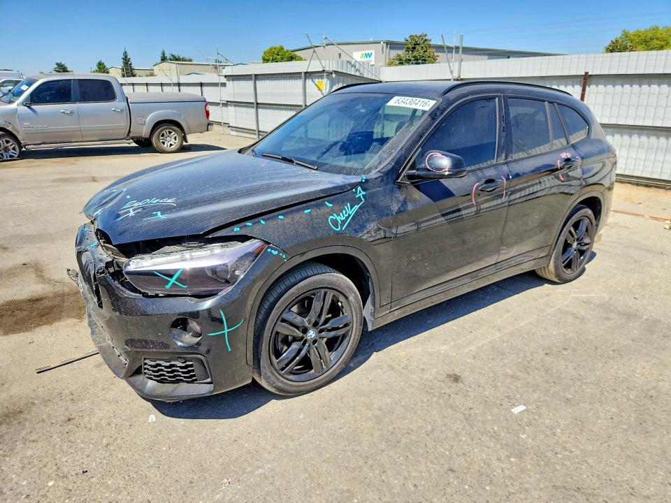 BMW X1 2018 with VIN WBXHT3C33J5L28814 - Photo from auction