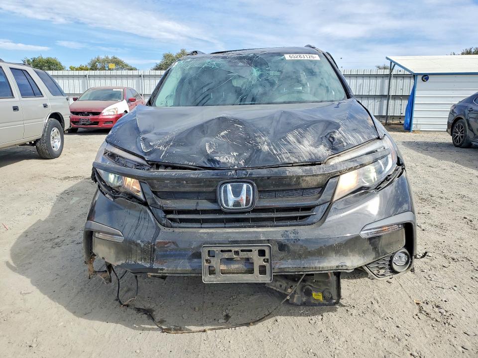 Photo 5 from auction – 2022 HONDA PILOT with VIN 5FNYF6H20NB090527