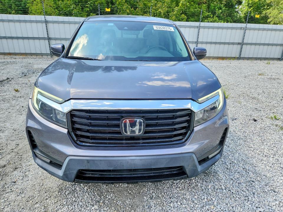 Photo 5 from auction – 2022 HONDA RIDGELINE with VIN 5FPYK3F73NB010654