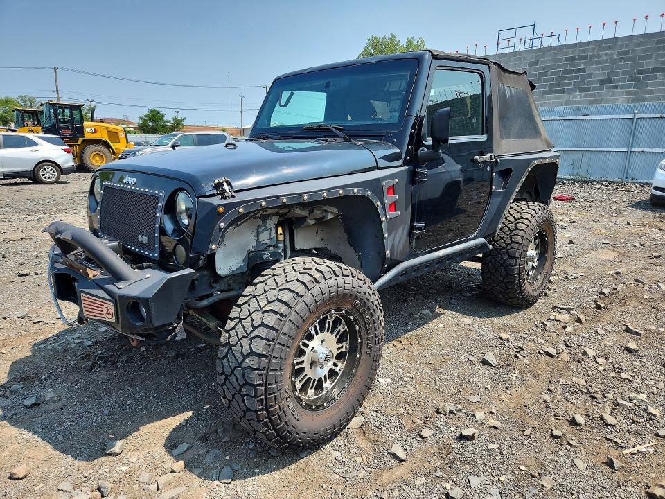 JEEP WRANGLER 2011 with VIN 1J4AA2D15BL516110 - Photo from auction