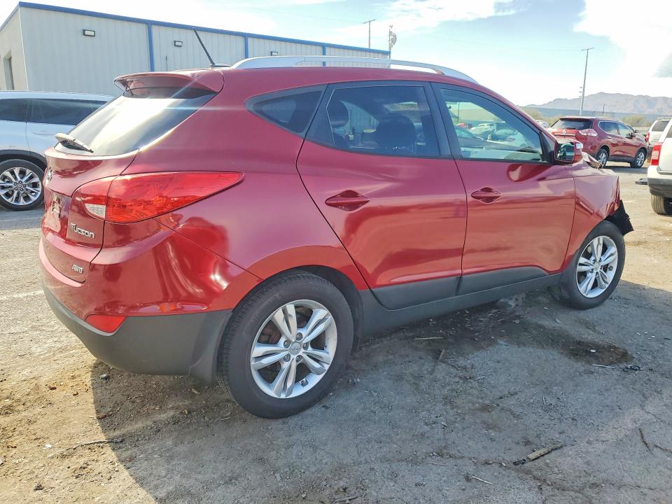 Photo 3 from auction – 2012 HYUNDAI TUCSON with VIN KM8JUCAC5CU511179