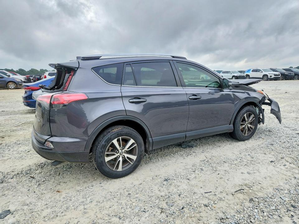 Photo 3 from auction – 2018 TOYOTA RAV4 with VIN JTMWFREV6JJ150742
