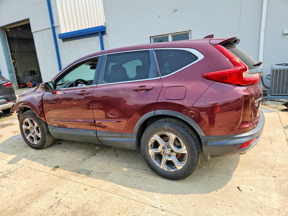 Photo 2 from auction – 2019 HONDA CR-V with VIN 2HKRW2H50KH620693
