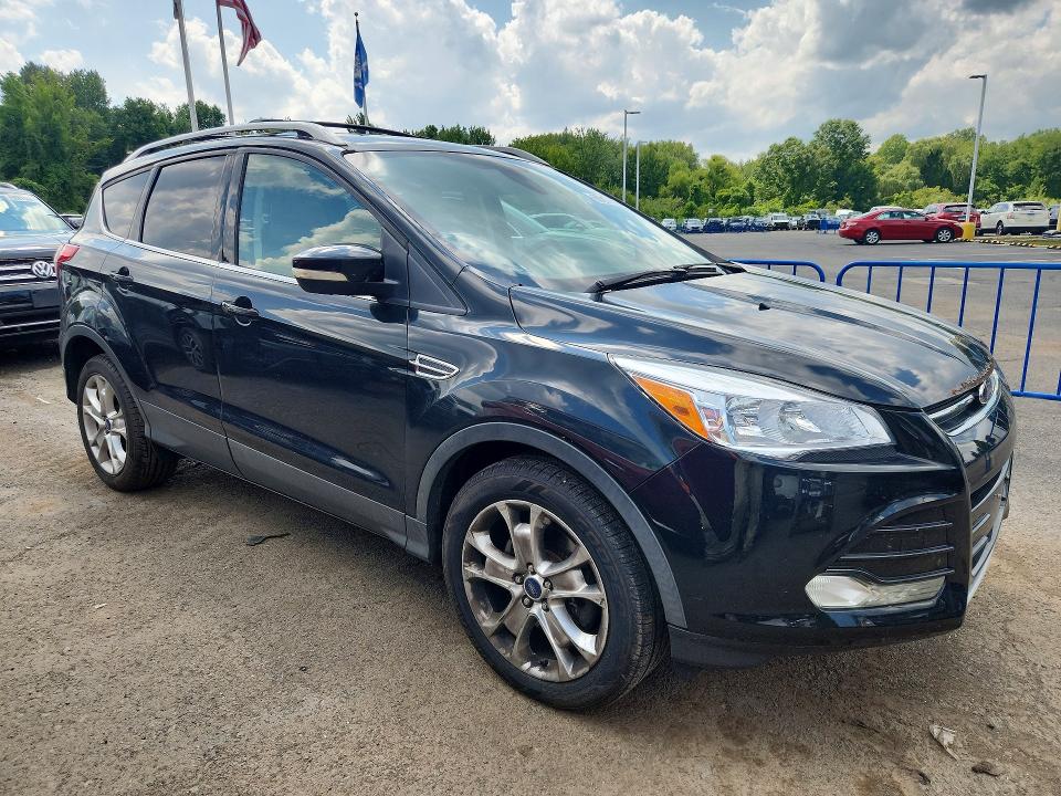 Photo 4 from auction – 2015 FORD ESCAPE with VIN 1FMCU9J99FUA55885