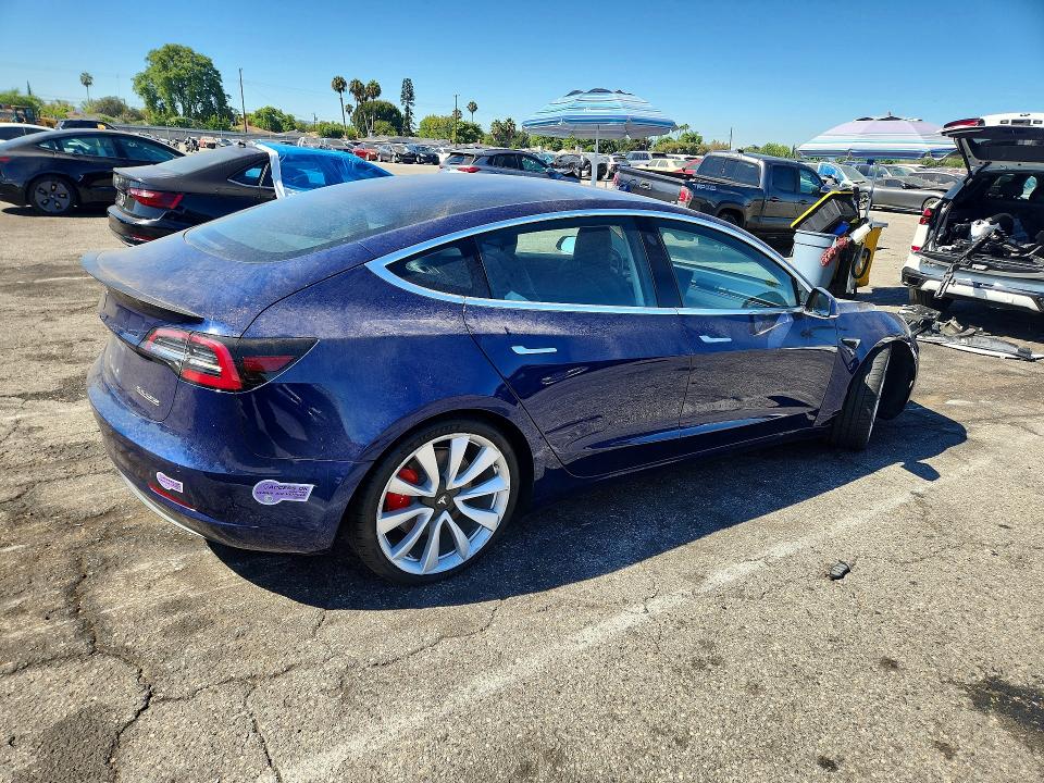 Photo 3 from auction – 2018 TESLA MODEL 3 with VIN 5YJ3E1EB2JF083903