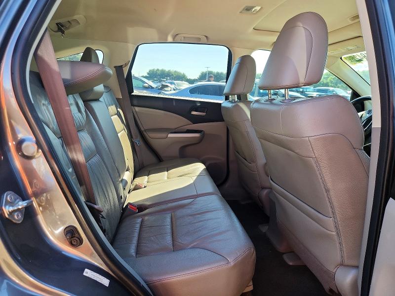 Photo 11 from auction – 2014 HONDA CR-V with VIN 2HKRM4H79EH669754