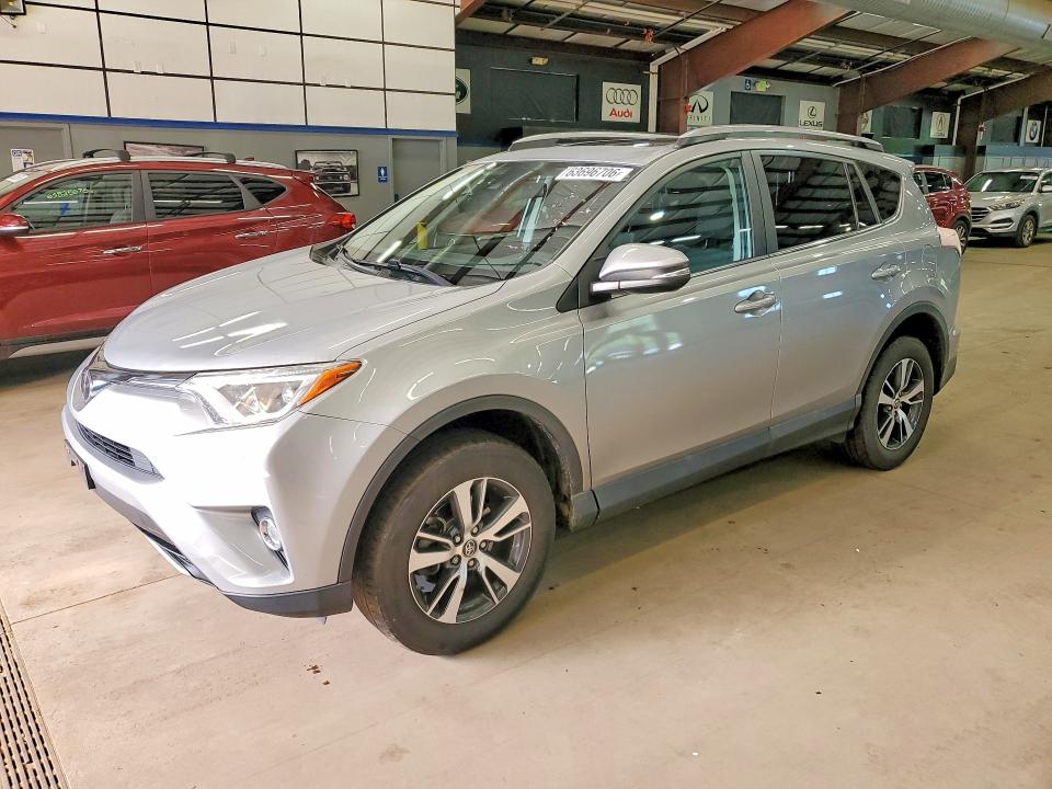 TOYOTA RAV4 2018 with VIN 2T3RFREV3JW796397 - Photo from auction