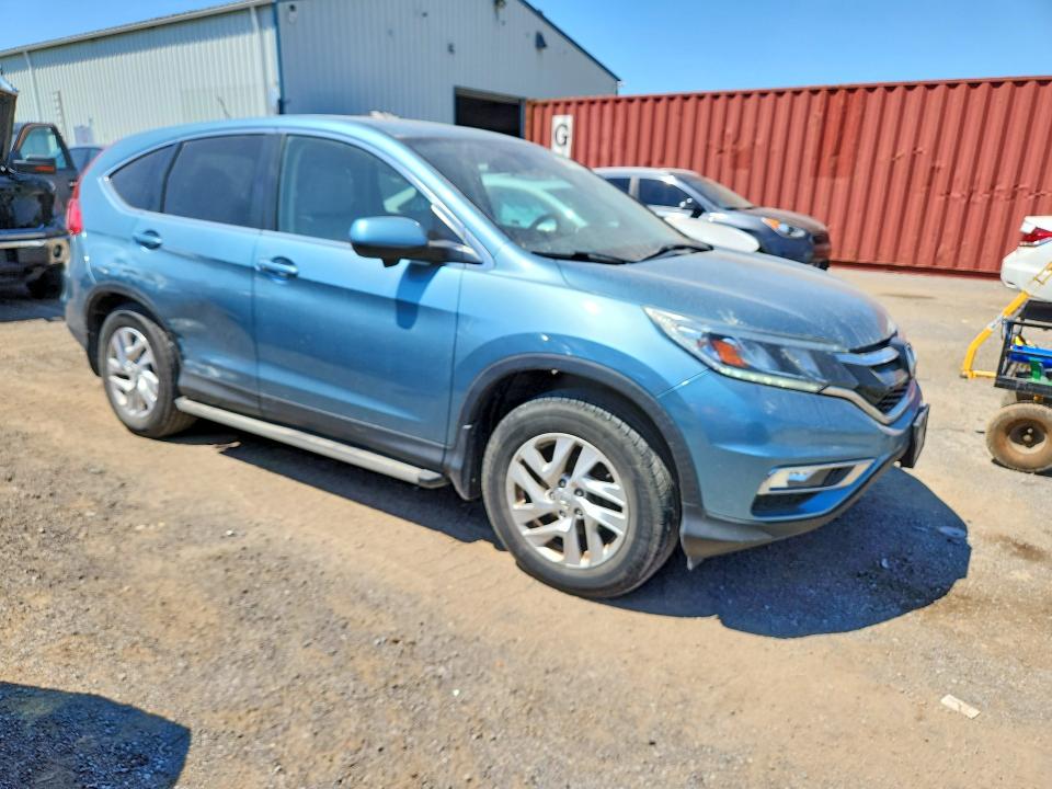 Photo 4 from auction – 2015 HONDA CR-V with VIN 2HKRM4H76FH114911