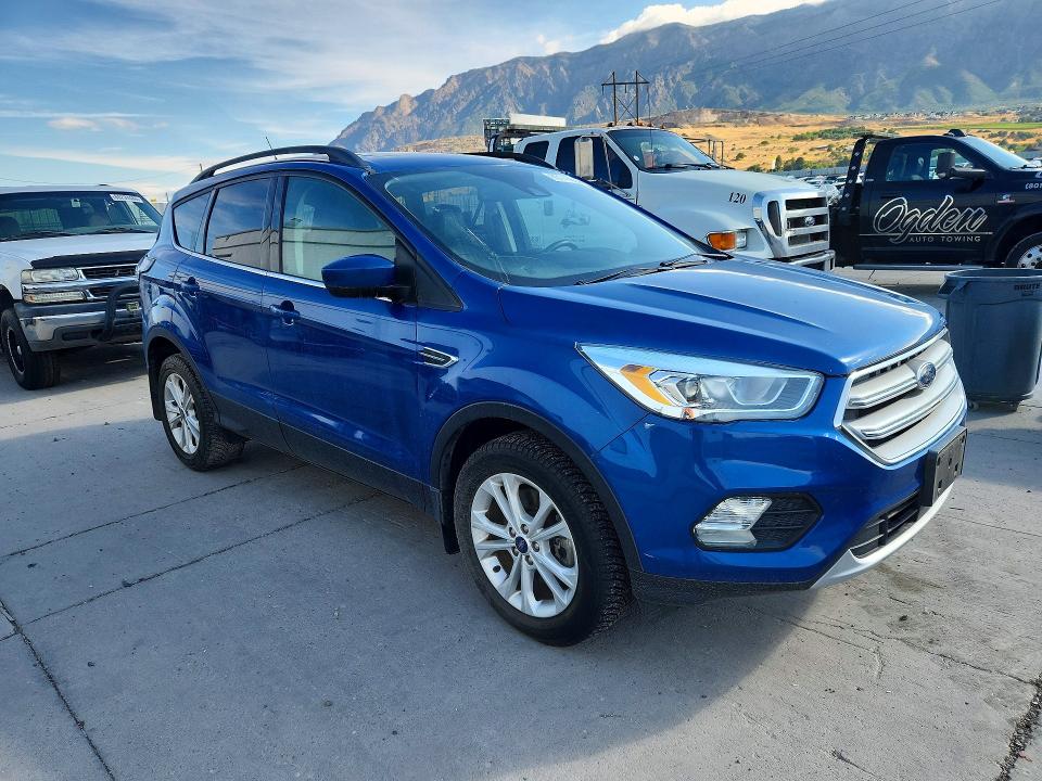 Photo 4 from auction – 2018 FORD ESCAPE with VIN 1FMCU9HD1JUD15439