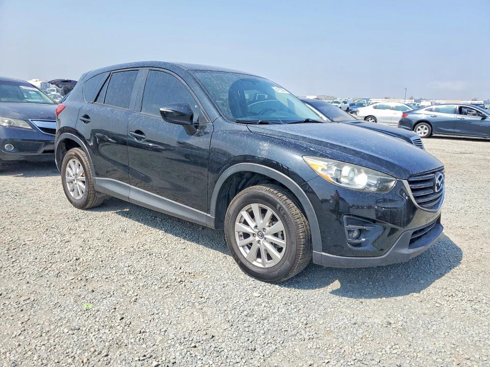 Photo 4 from auction – 2016 MAZDA CX-5 with VIN JM3KE2CY6G0801248
