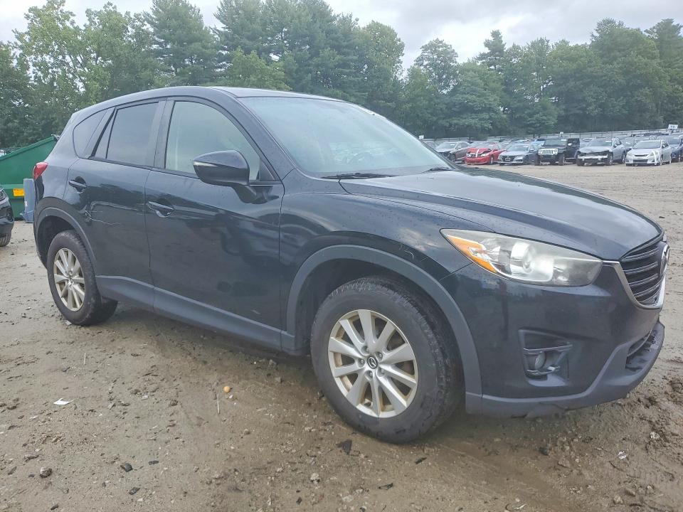 Photo 4 from auction – 2016 MAZDA CX-5 with VIN JM3KE4CYXG0779590