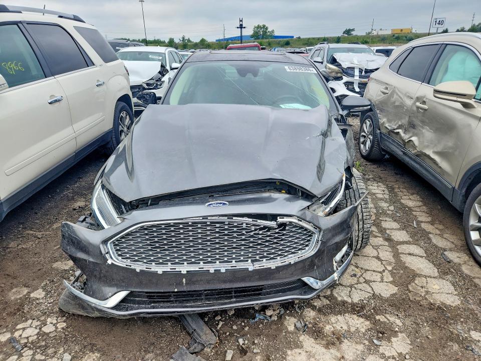 Photo 5 from auction – 2019 FORD FUSION with VIN 3FA6P0RU3KR220334