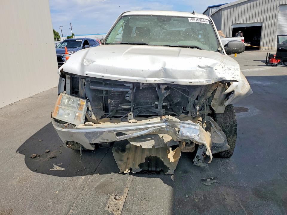 Photo 5 from auction – 2009 GMC SIERRA with VIN 1GTEC14X79Z213658