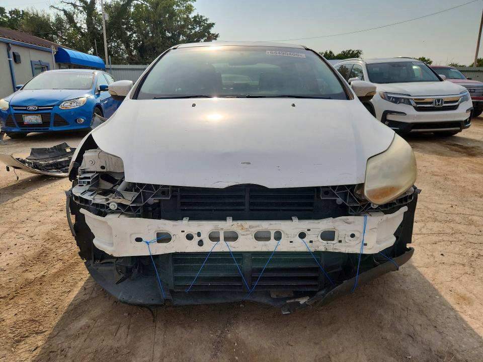 Снимка 5 от търг – 2013 FORD FOCUS с VIN 1FADP3J21DL144732
