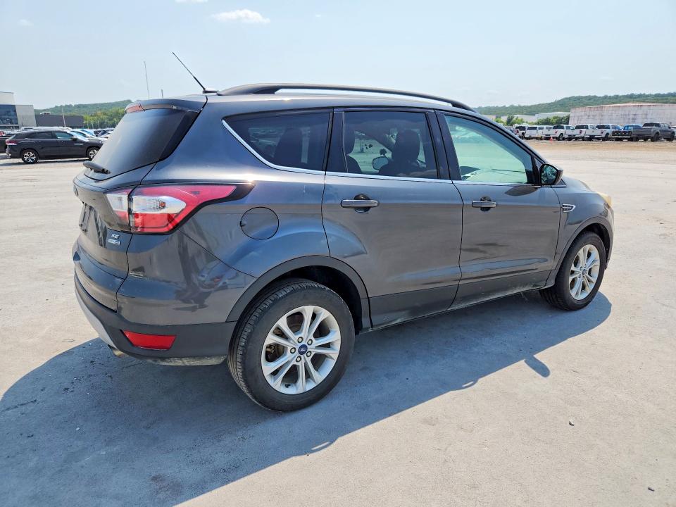 Photo 3 from auction – 2018 FORD ESCAPE with VIN 1FMCU9GD8JUB36235
