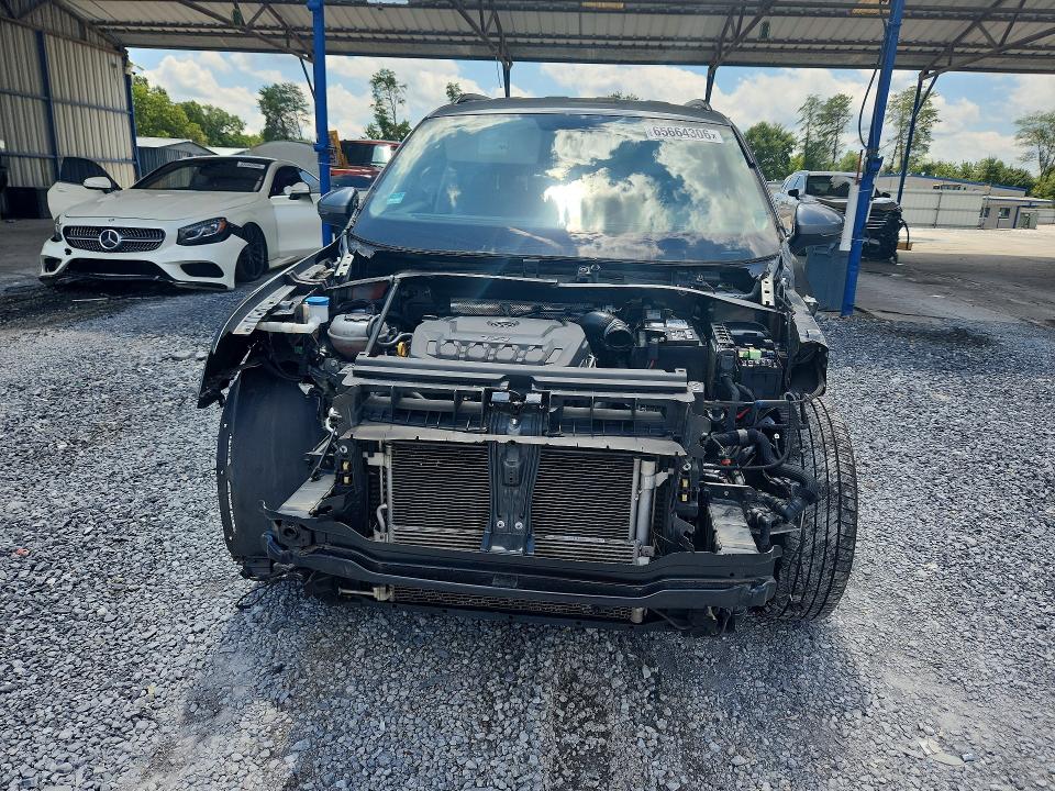 Photo 5 from auction – 2018 VOLKSWAGEN TIGUAN with VIN 3VV1B7AX3JM033481