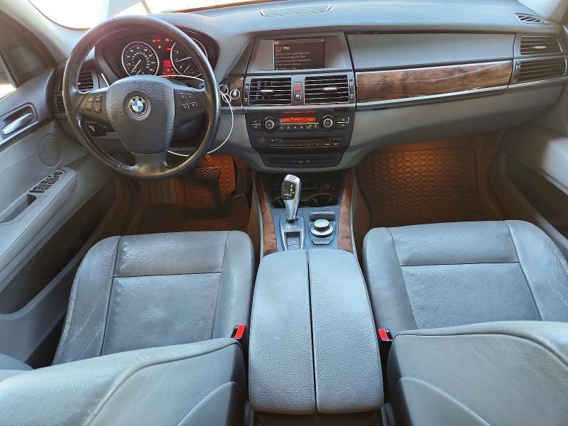 Photo 8 from auction – 2007 BMW X5 with VIN 4USFE43577LY79946