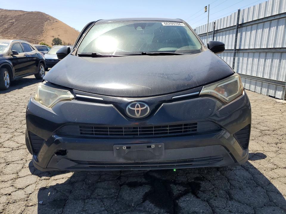 Photo 5 from auction – 2018 TOYOTA RAV4 with VIN 2T3ZFREV7JW408281