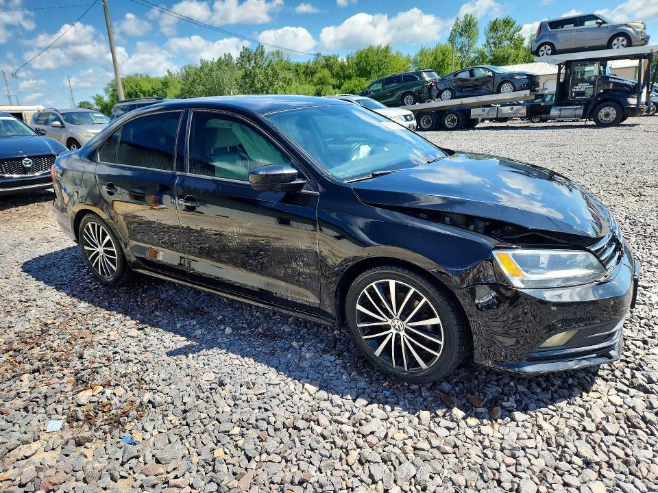 Photo 4 from auction – 2015 VOLKSWAGEN JETTA with VIN 3VWD17AJ7FM203372