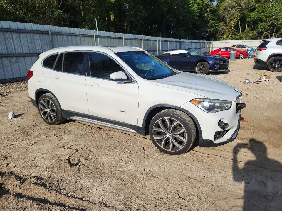 Photo 4 from auction – 2017 BMW X1 with VIN WBXHT3C30H5F70537
