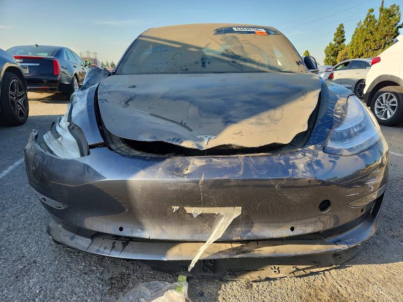 Photo 11 from auction – 2018 TESLA MODEL 3 with VIN 5YJ3E1EA3JF157661
