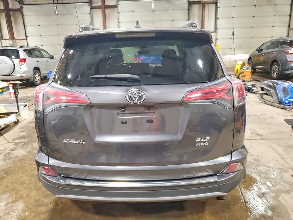 Photo 6 from auction – 2017 TOYOTA RAV4 with VIN JTMRFREV0HJ113158