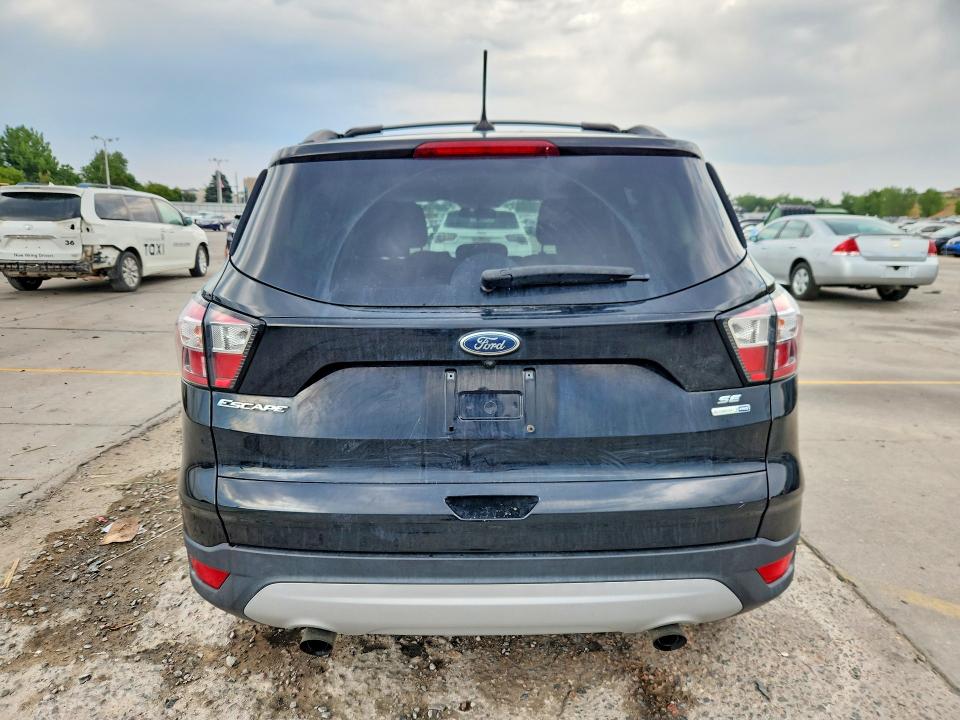 Photo 6 from auction – 2018 FORD ESCAPE with VIN 1FMCU9GD2JUA90482