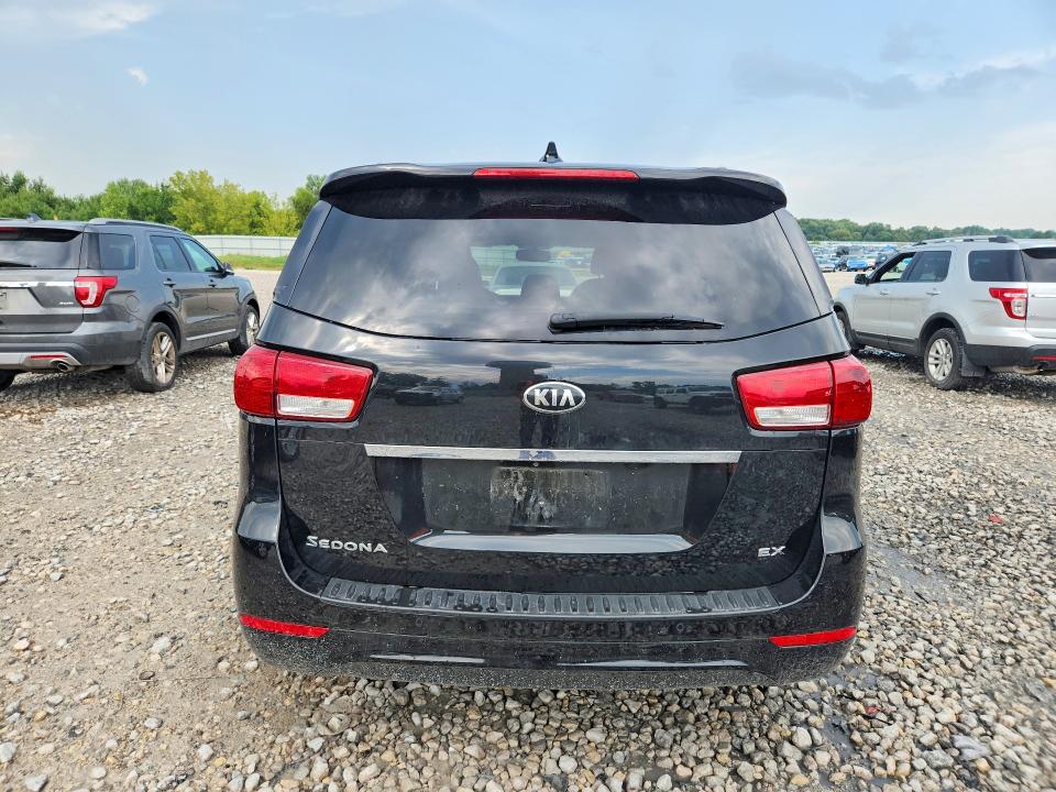 Foto 6 de la subasta – 2015 KIA SEDONA con VIN KNDMC5C19F6026192