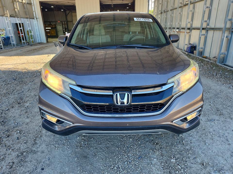Photo 5 from auction – 2016 HONDA CR-V with VIN 2HKRM4H50GH622713