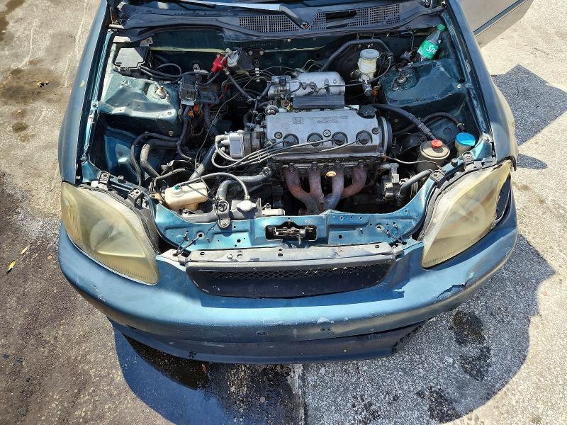 Photo 11 from auction – 1997 HONDA CIVIC with VIN 2HGEJ8640VH539184