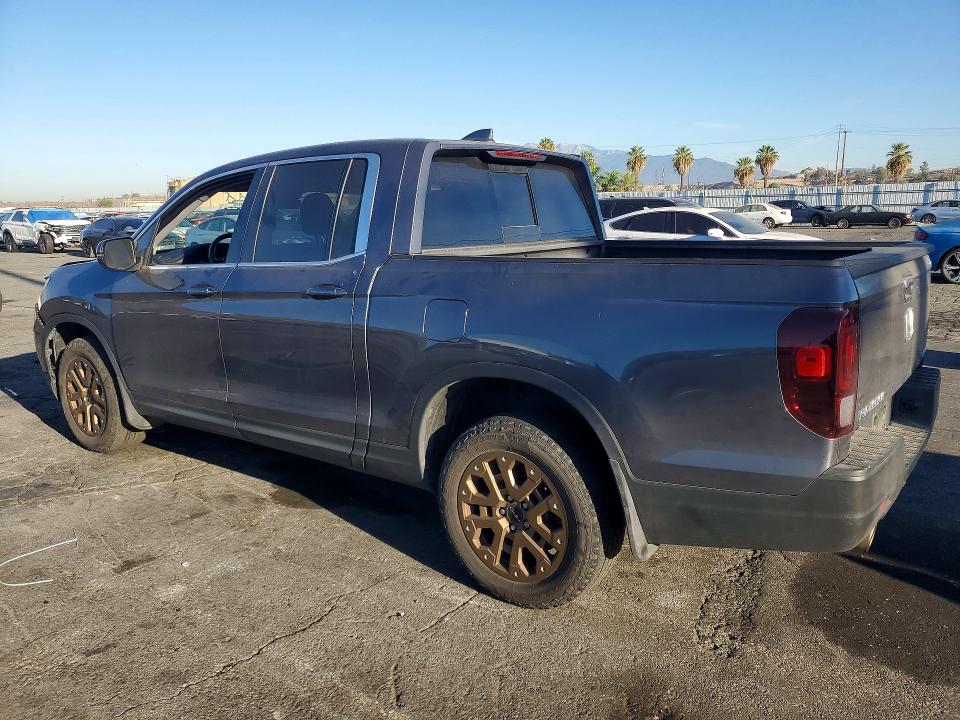Photo 2 from auction – 2023 HONDA RIDGELINE with VIN 5FPYK3F56PB058246