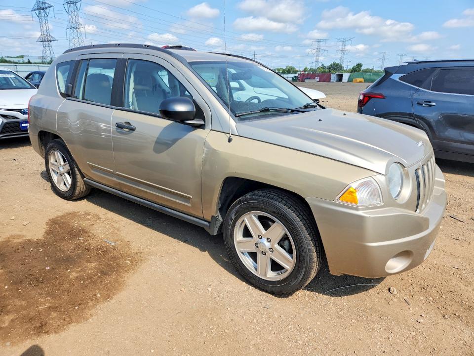 Photo 4 from auction – 2009 JEEP COMPASS with VIN 1J4FT47A69D173853