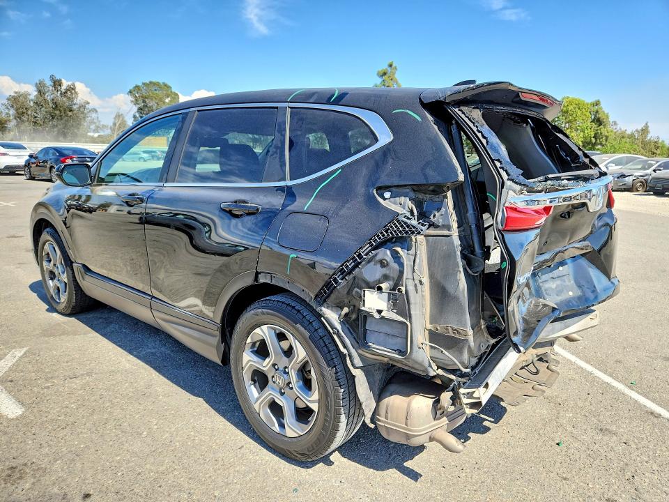 Photo 2 from auction – 2017 HONDA CR-V with VIN 7FARW1H89HE023851