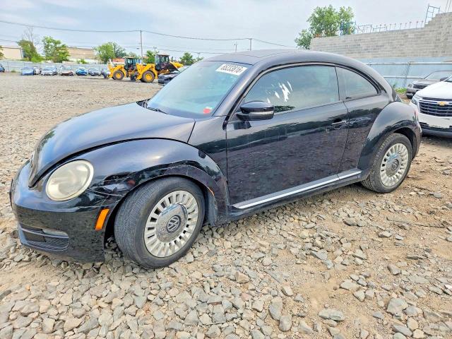 VOLKSWAGEN BEETLE 2014 with VIN 3VWJP7AT6EM608415 - Photo from auction