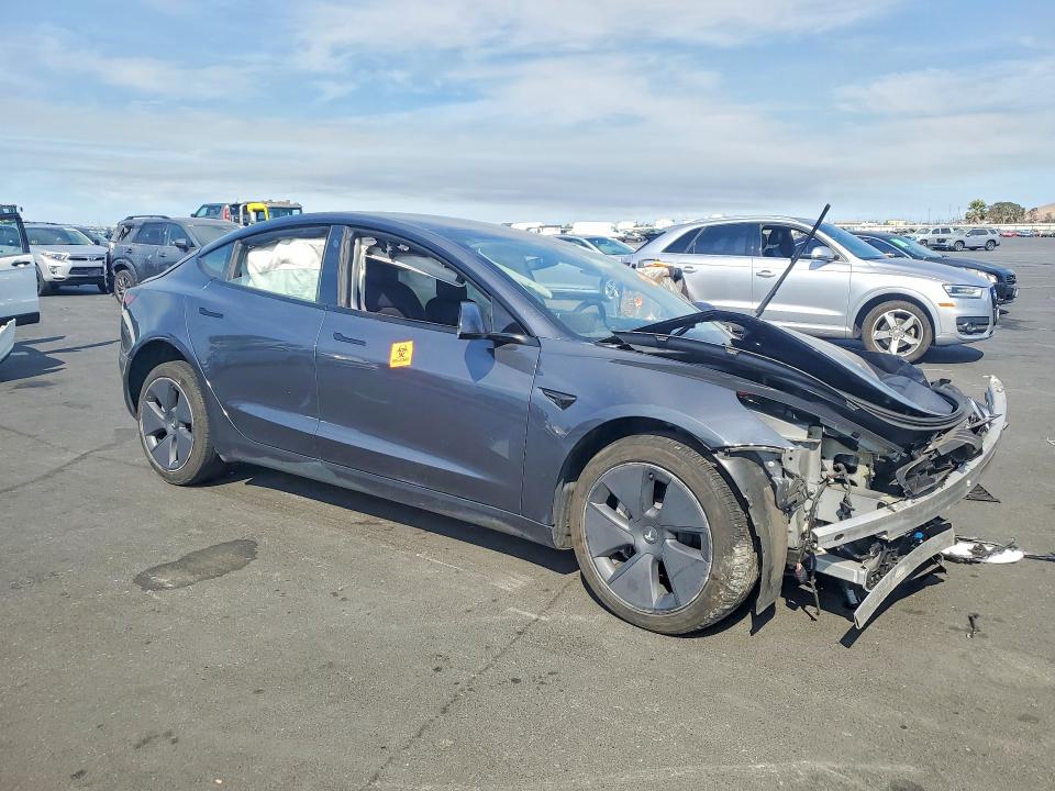Photo 4 from auction – 2022 TESLA MODEL 3 with VIN 5YJ3E1EA3NF351709