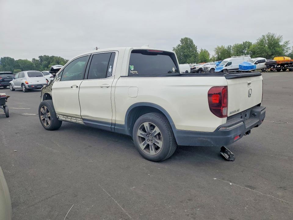 Photo 2 from auction – 2017 HONDA RIDGELINE with VIN 5FPYK2F55HB007235