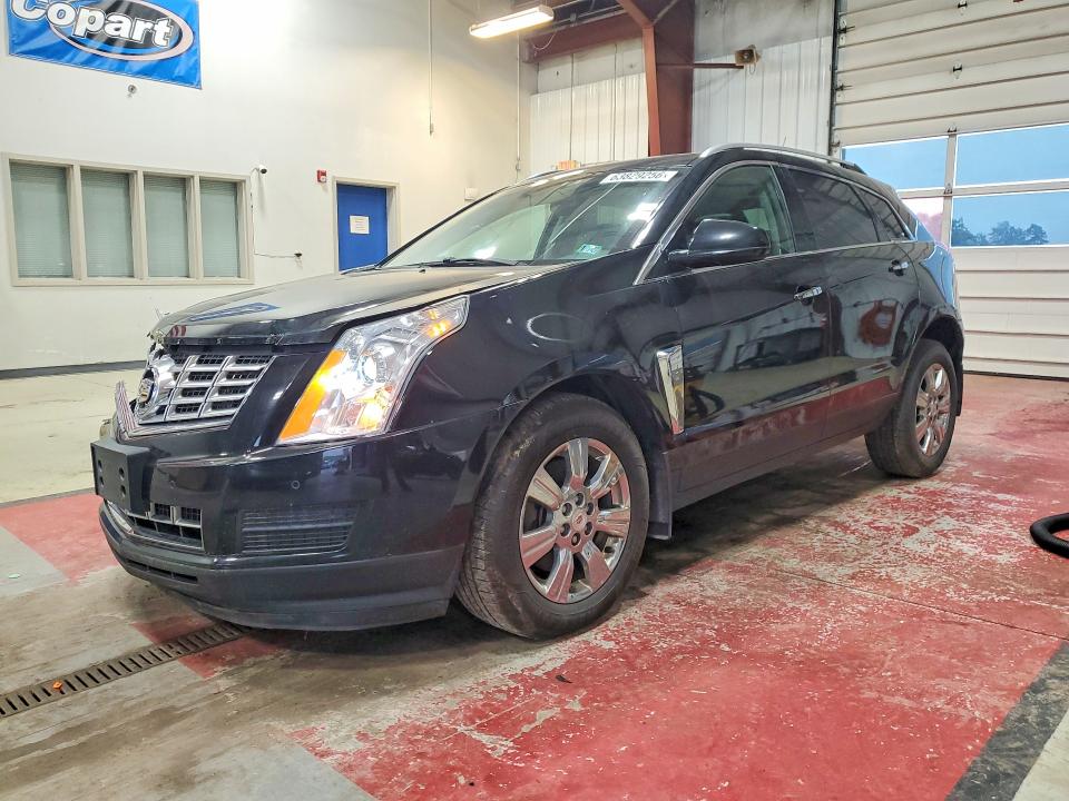 CADILLAC SRX 2014 with VIN 3GYFNEE35ES682282 - Photo from auction