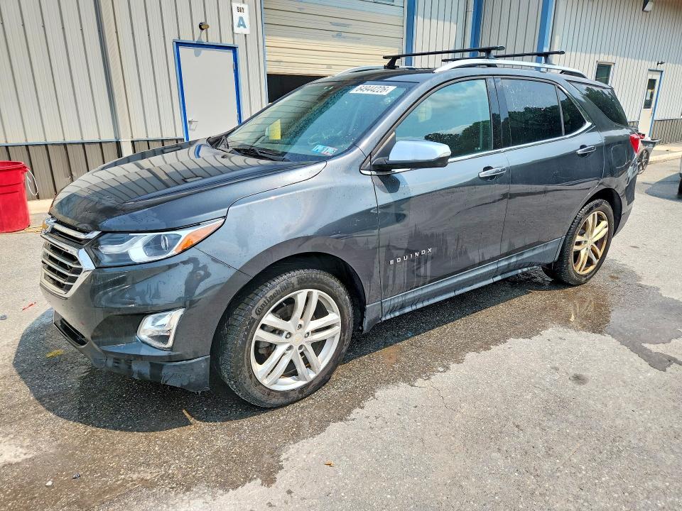 CHEVROLET EQUINOX 2018 with VIN 2GNAXWEX7J6169733 - Photo from auction