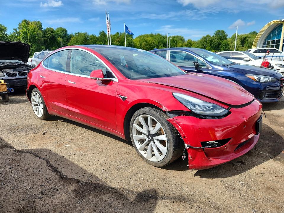 Photo 4 from auction – 2018 TESLA MODEL 3 with VIN 5YJ3E1EB5JF146136