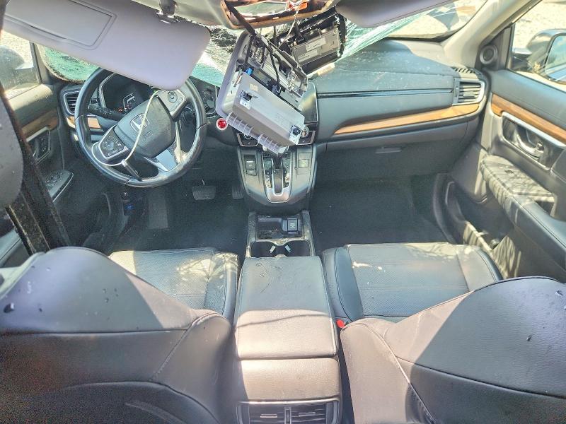 Photo 8 from auction – 2018 HONDA CR-V with VIN 7FARW1H81JE025454
